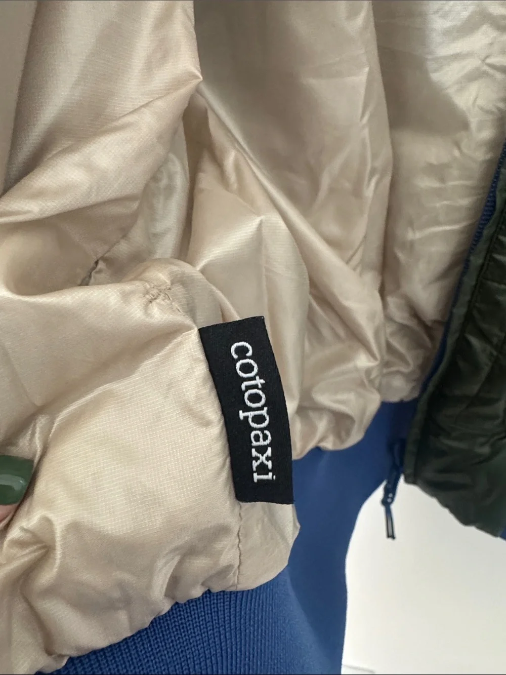 Cotopaxi Kusa Reversible Insulated Bomber Jacket Olive Green Tan Llama Women’s M